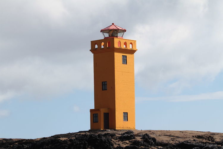 Low angle view of lighthouse against sky