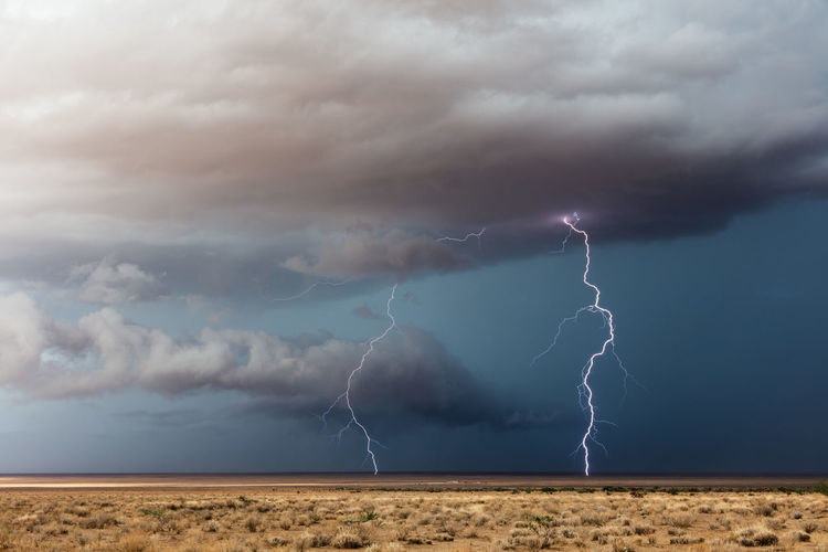 Lightning in sky over land