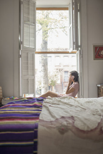 Young woman talking on her smartphone