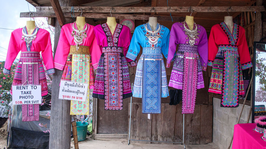 Rear view of people in traditional clothing store