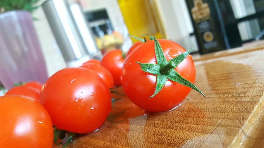 Close-up of fresh tomatoes on table