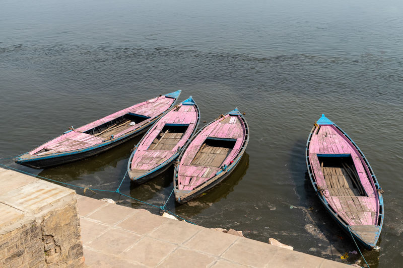 High angle view of boats moored on the ganges river, varanasi, uttar pradesh, india