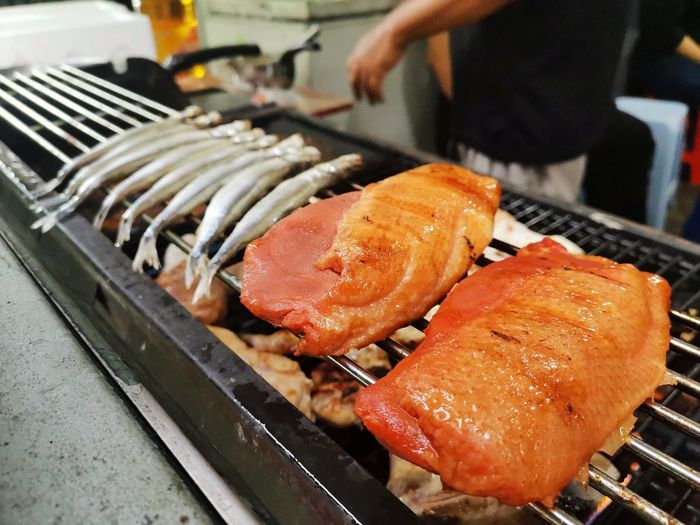 Close-up of seafood on barbecue grill
