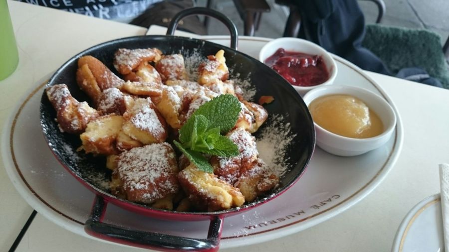 High angle view of kaiserschmarrn in cooking pan on table