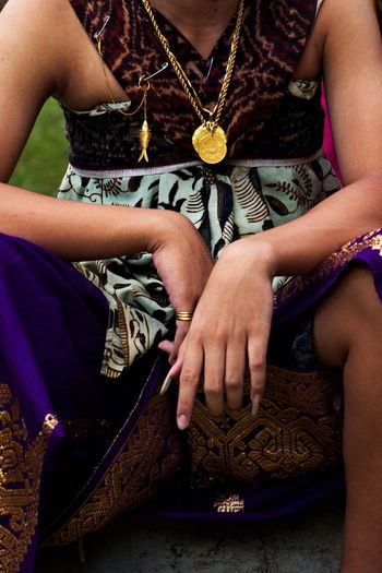 Tenganan youth wear traditional full clothes to attend traditional ceremonies.