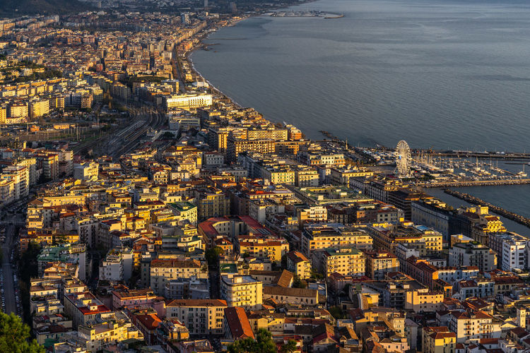 Aerial view of salerno historic center at sunset from the arechi castle, campania, italy