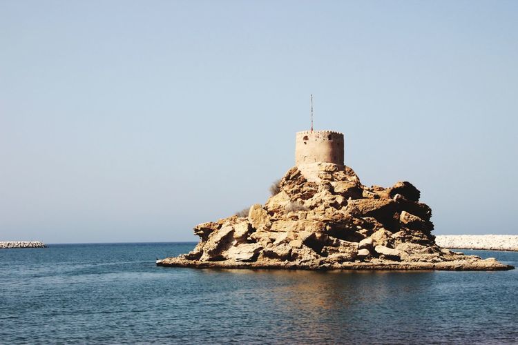 A old tower on a rock in oman