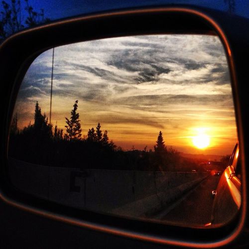 Sunset seen through car windshield