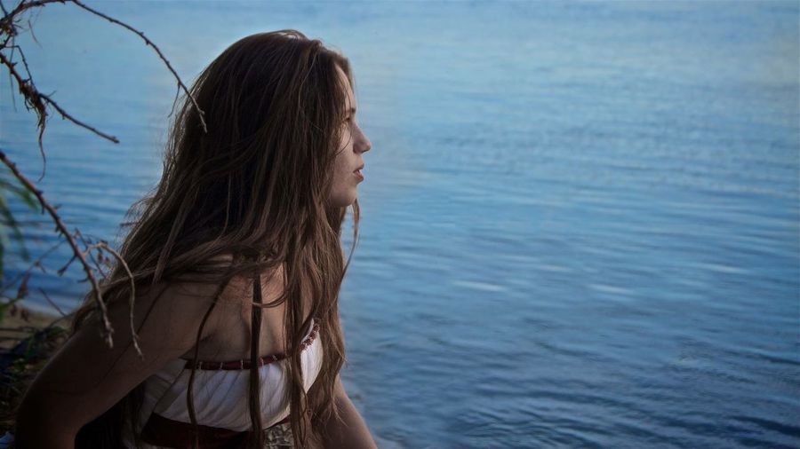 Young woman looking at sea
