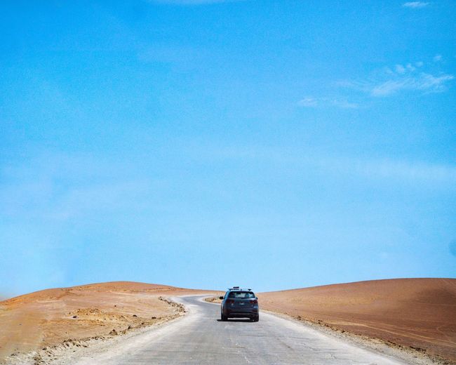 Car on road in desert