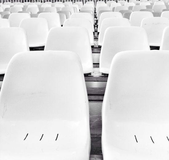 Empty chairs in a row