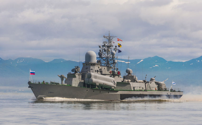 Russian warship going along the coast of kamchatka