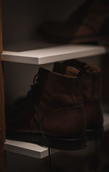 Close-up of shoes on table at home