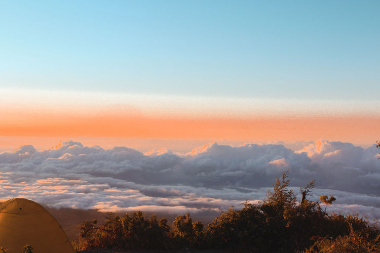 Scenic view of mountains against sky during sunset