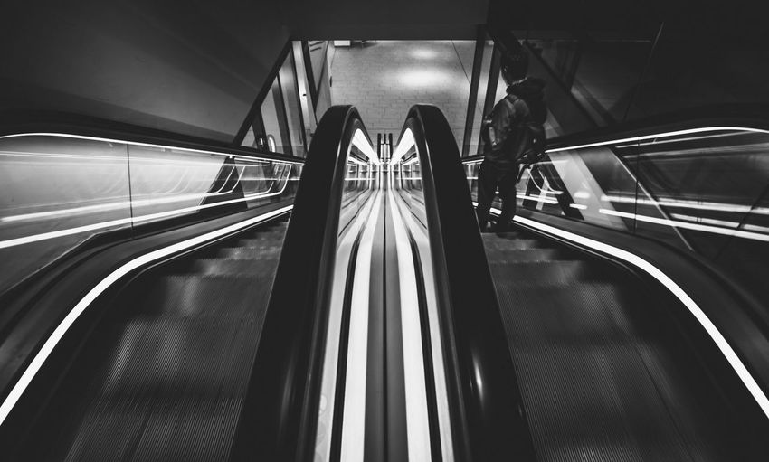 High angle view of man on escalator at subway station