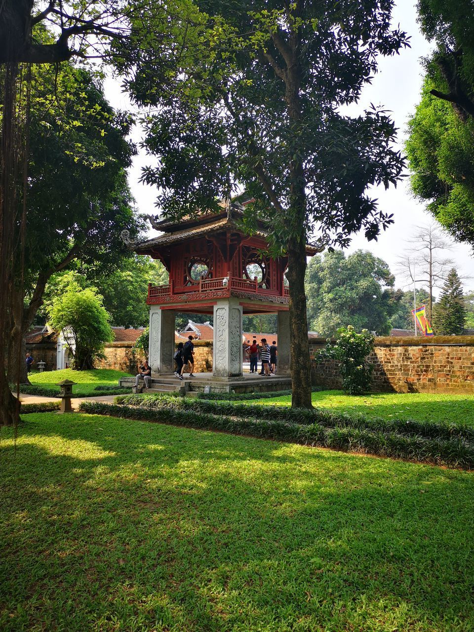 TREES AND LAWN IN FRONT OF TEMPLE