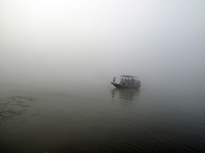 Misty morning on the holiest of rivers in india. ganges delta in sundarbans, west bengal, india.