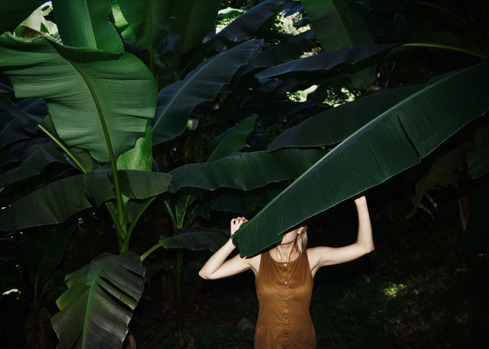 Hiding Game Dark Green Linas Was Here Massive Nature Botanical Brown Dress Garden Girl Hiding Face Leaves Palm Trees Park The Traveler - 2018 EyeEm Awards My Best Travel Photo