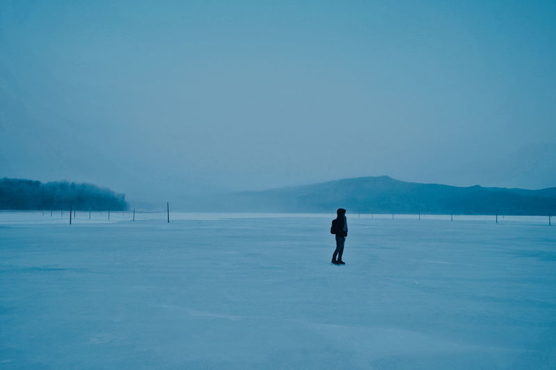 Full length of man on snow against sky