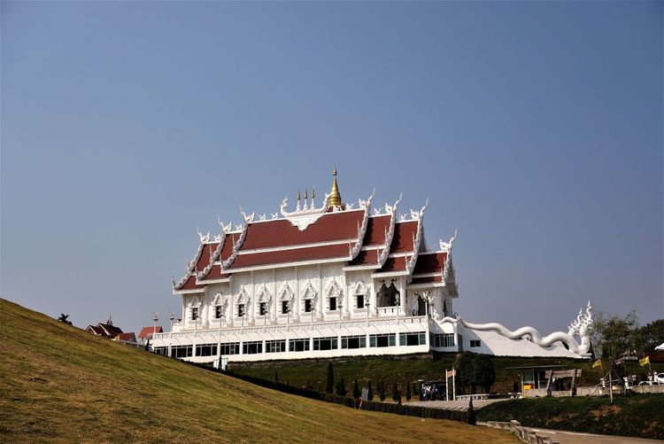 View of temple building against clear sky