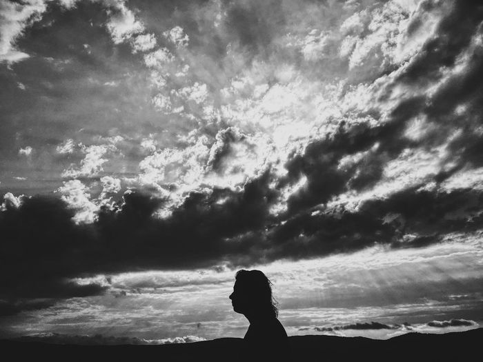 Silhouette of man against sky