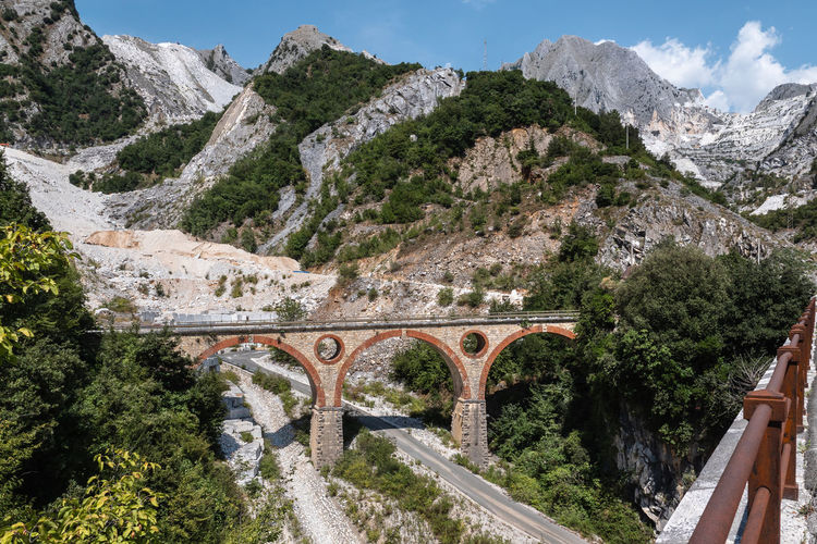 Bridge of vara in carrara, site of the old private marble railway - tuscany, italy.