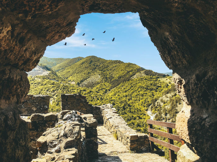 Scenic view of rock formations against sky