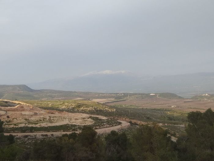 High angle view of agricultural field against sky