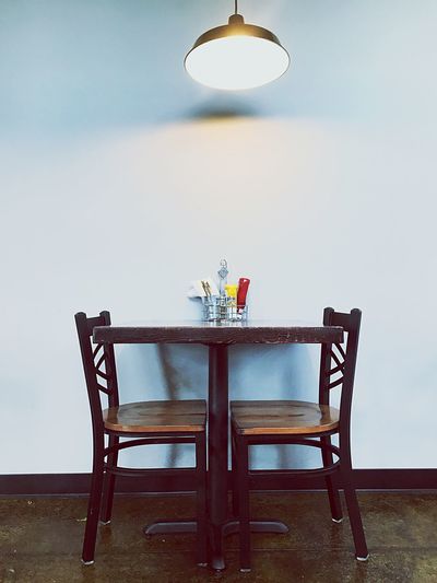 Table and chairs in restaurant