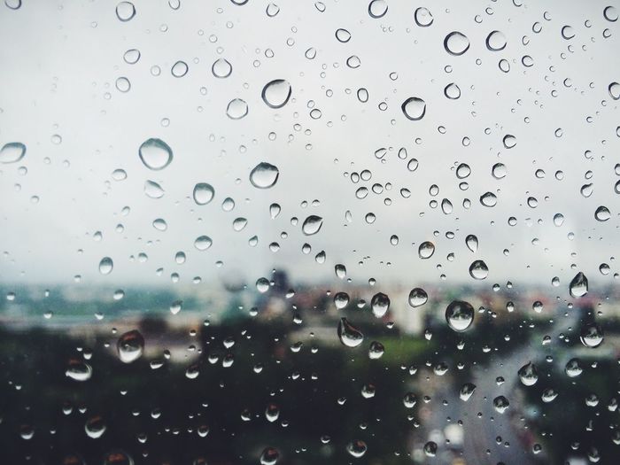 Close-up of water drops on glass