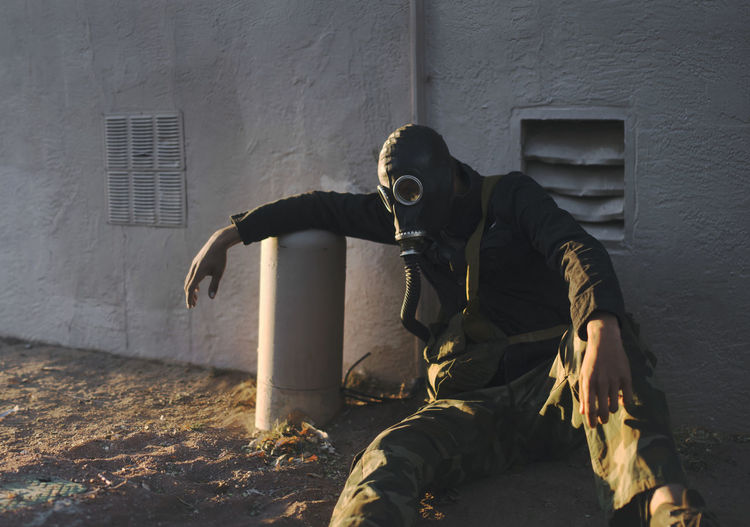 Portrait of man in gas mask