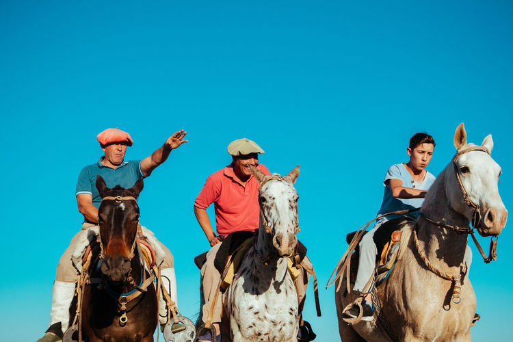 Family riding horse