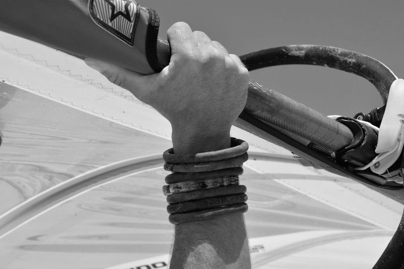 Close-up of hand on boat
