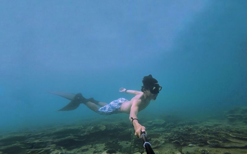 Full length of man swimming in sea