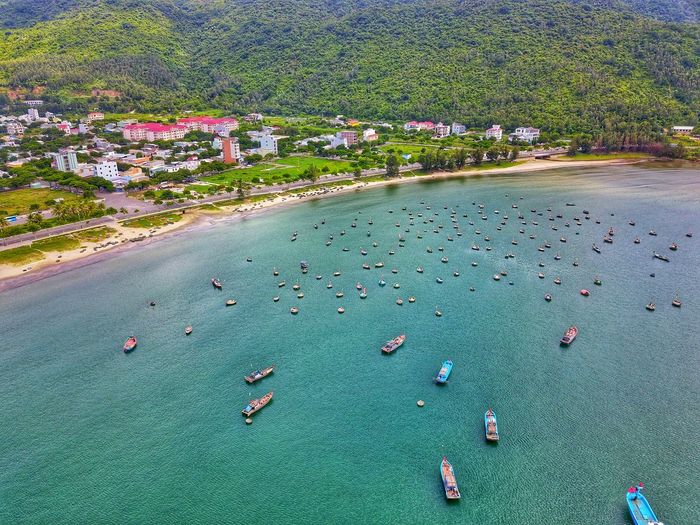 High angle view of boats on sea shore