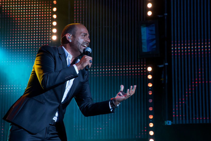 Singer performing in concert