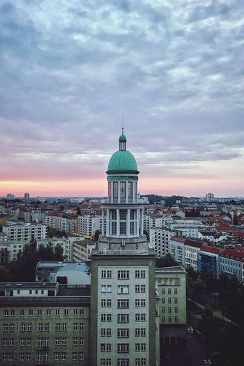 Frankfurter tor tower in berlin in stalin style with sunset