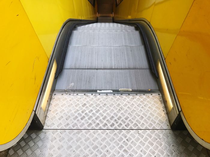 High angle view of yellow escalator
