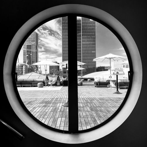 City seen through glass window
