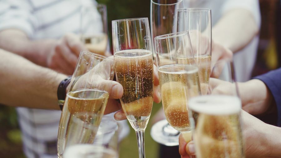 People toasting with champagne flute