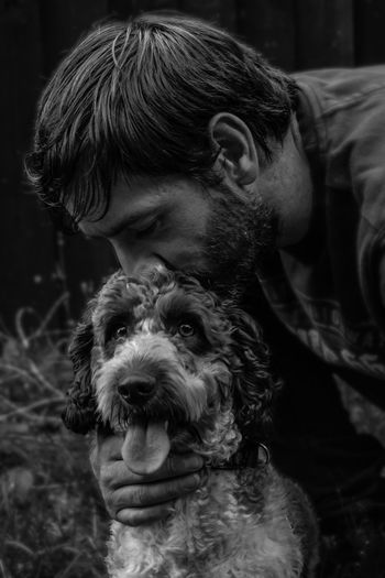 Portrait of man with dog