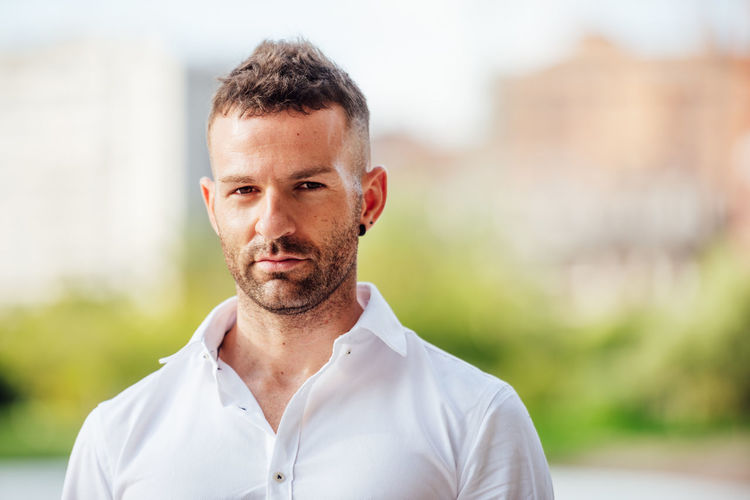 Portrait of man standing outdoors