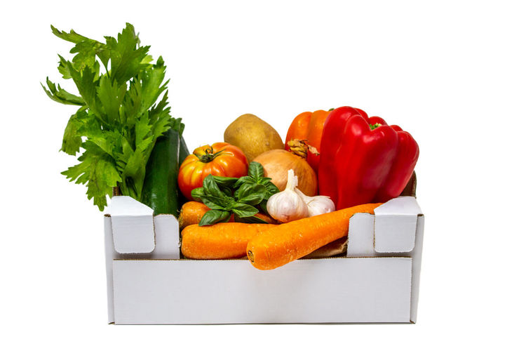 Close-up of fruits and vegetables on white background