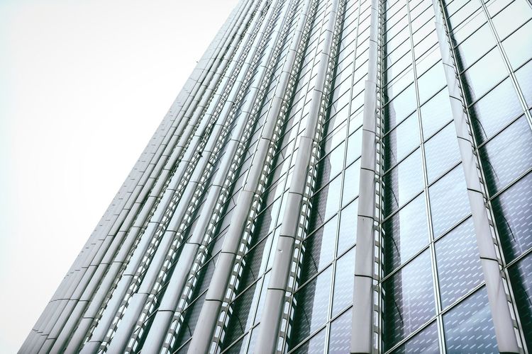 Low angle view of modern building against clear sky