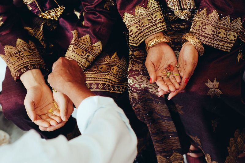 High angle view of bride and groom at malaysian wedding