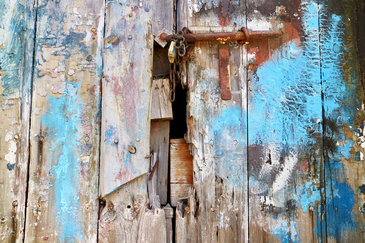 Close-up of old weathered wooden door