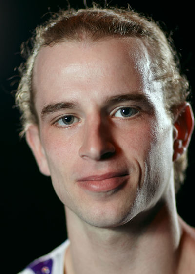 Close-up portrait of smiling young man 