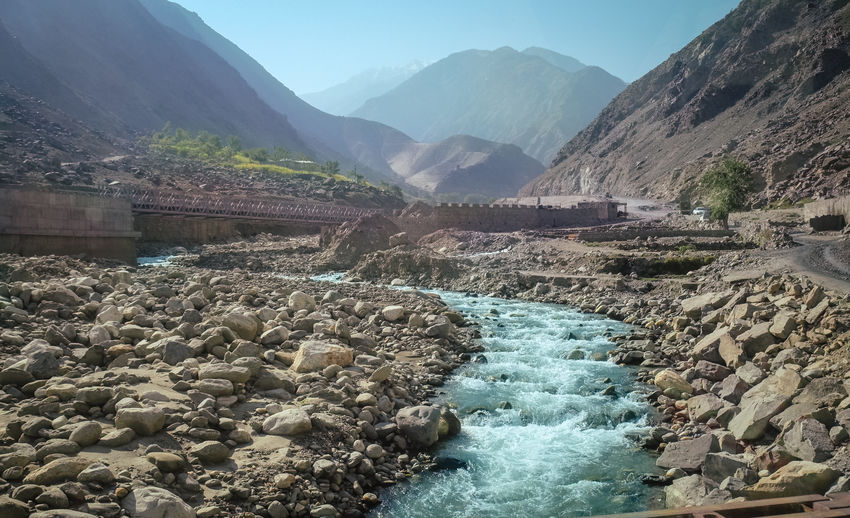 Flowing river along karakoram mountain range. gilgit baltistan in summer, pakistan.