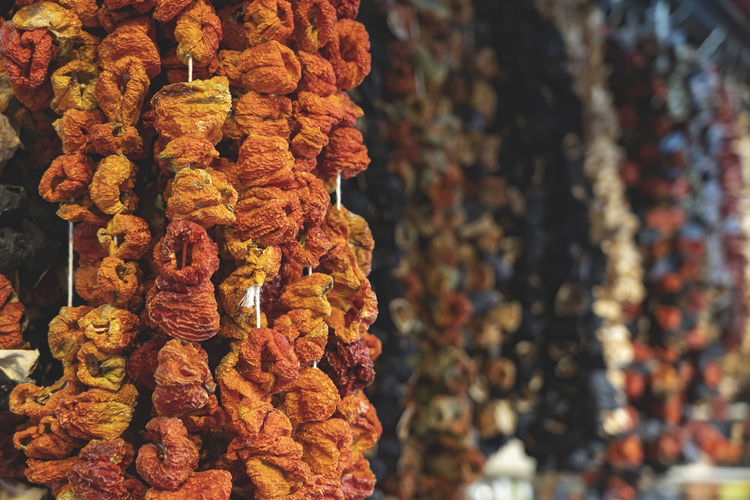 Dried vegetables hanging vertical in istanbul s egyptian  bazaar selective focus.