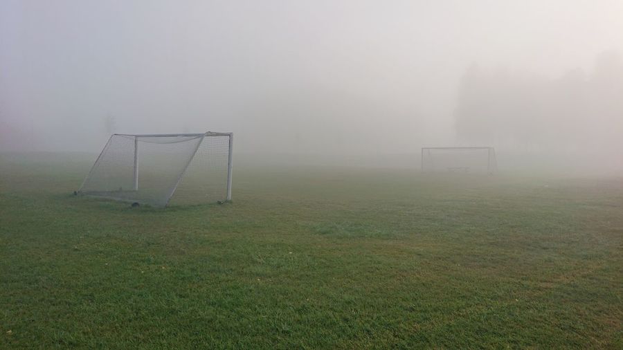 View of soccer field in foggy weather